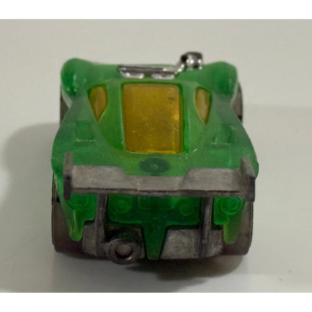 Hot Wheels Paradigm Shift Kids 1:64 Green Translucent Diecast Race Car Spoiler